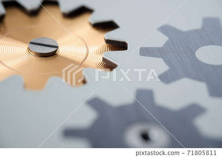 Mechanism with metal gears and threads closeup Mechanism with metal gears and threads closeup 71805811