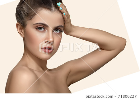 Beautiful young woman with clean perfect skin. 71806227