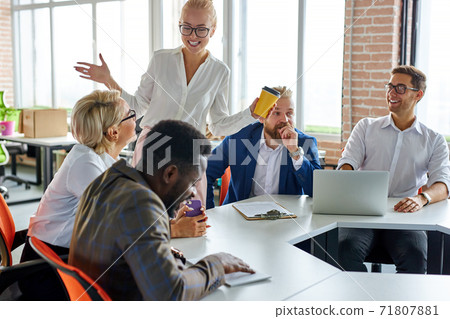 good-looking pleasant female boss executive discuss business ideas with employees good-looking pleasant female boss executive discuss business ideas with employees 71807881
