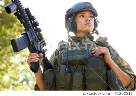 brave caucasian woman is engaged in hunting weapon gun or rifle brave caucasian woman is engaged in hunting weapon gun or rifle 71808511