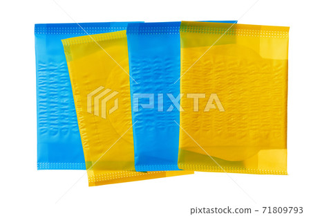 Packed female medical pad isolated on white background 71809793