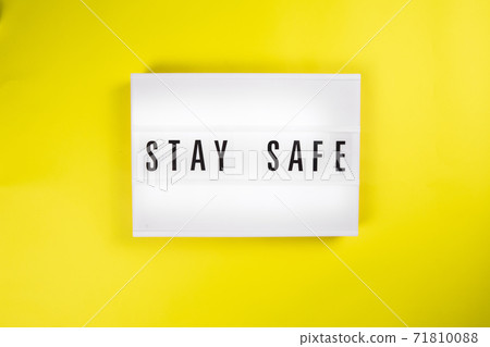 Stay Safe message on lightbox on yellow background isolated Stay Safe message on lightbox on yellow background isolated 71810088