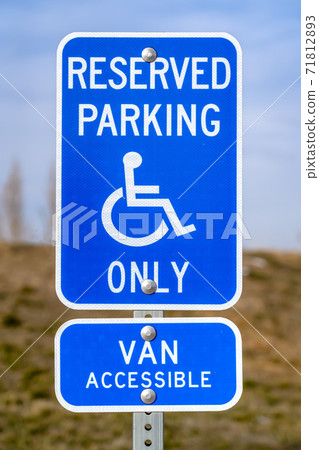 Blue Reserved Parking Van Accessible sign with a man on a wheelchair icon Blue Reserved Parking Van Accessible sign with a man on a wheelchair icon 71812893
