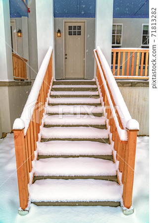 Stairs leading to the front porch and door of a home in Daybreak Utah 71813282