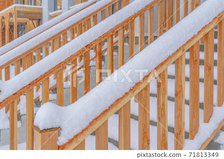 Close up of the outdoor stairs of a home in Daybreak Utah during winter 71813349