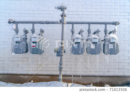 Water meters and pipes covered with ice during winter in Eagle Mountain Water meters and pipes covered with ice during winter in Eagle Mountain 71813508