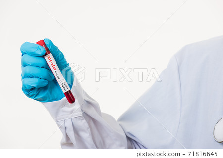 Doctor scientist in white uniform wear a mask holding test tube Coronavirus Doctor scientist in white uniform wear a mask holding test tube Coronavirus 71816645