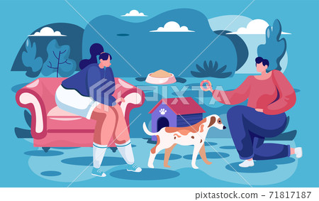 Man and woman pet owners sitting with a dog, teach him commands. People feed a sad stray dog 71817187