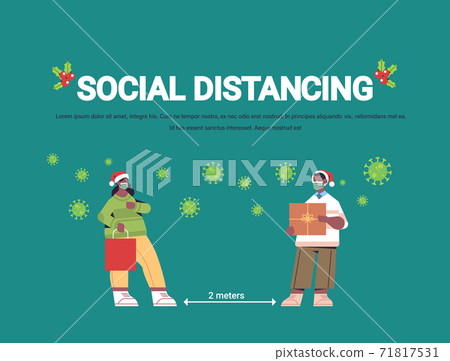 couple in masks keeping social distance to prevent coronavirus pandemic new year christmas holidays celebration 71817531