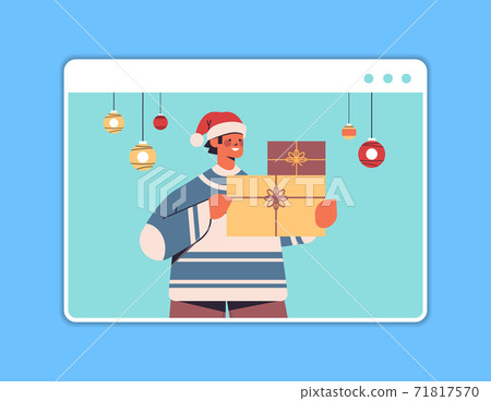 man in santa hat holding gift box guy having fun happy new year and merry christmas holidays celebration concept 71817570