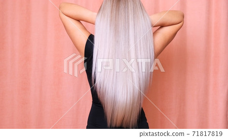 long blond hair of a young girl, rear view. long blond hair of a young girl, rear view. 71817819