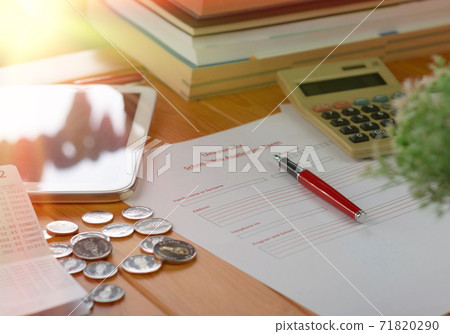 school scholarship application form on wooden table school scholarship application form on wooden table 71820290