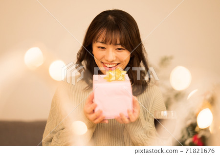 A woman who is pleased with the present A woman who is pleased with the present 71821676