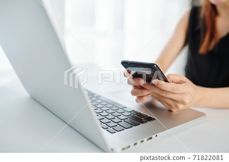 Texting busiesswoman Texting busiesswoman 71822081