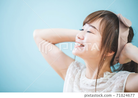 A woman showing a luck 71824677