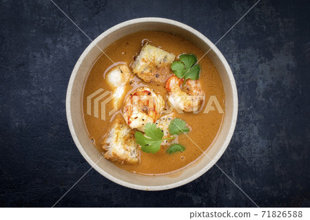 Traditional French fish soup with prawns and croutons Traditional French fish soup with prawns and croutons 71826588