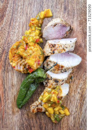 Modern style fried crocodile tail eye fillet with mango chili chutney paprika Modern style fried crocodile tail eye fillet with mango chili chutney paprika 71829090