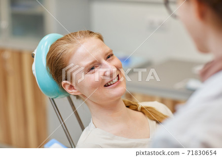 Woman at dental clinic Woman at dental clinic 71830654