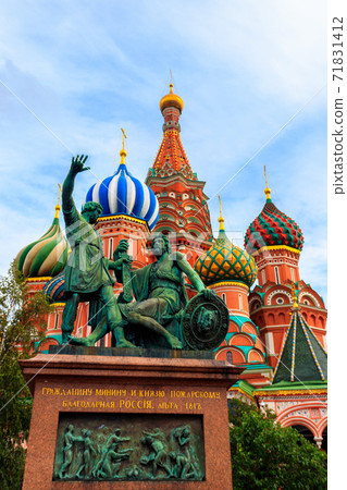 Monument of Minin and Pozharsky at front of St. Basil cathedral on Red Square in Moscow, Russia Monument of Minin and Pozharsky at front of St. Basil cathedral on Red Square in Moscow, Russia 71831412