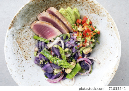 Modern style fried tuna fish filet salad with green asparagus blue potatoes Modern style fried tuna fish filet salad with green asparagus blue potatoes 71833241