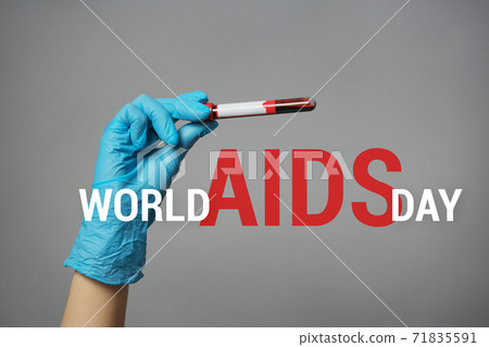 Nurse Holding Blood Sample World AIDS Day concept. Nurse Holding Blood Sample World AIDS Day concept. 71835591
