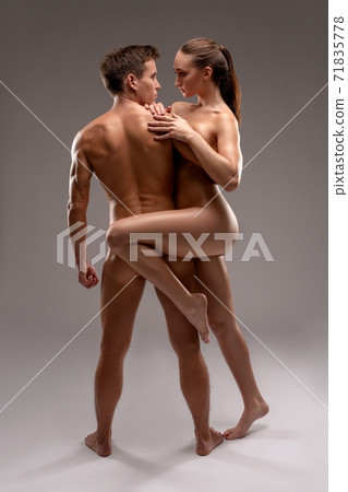 Passionate nude sexy young couple in studio Passionate nude sexy young couple in studio 71835778