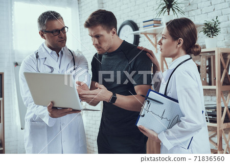Woman doctor reassures a patient. Woman doctor reassures a patient. 71836560