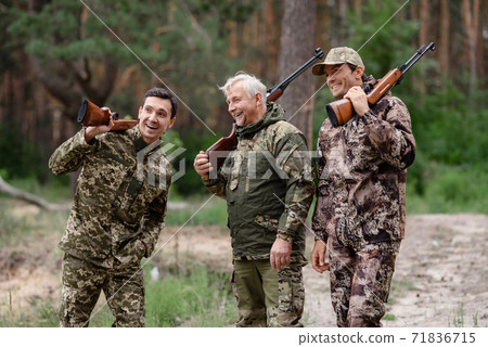 Family Hunting Happy Men Talking and Laughing. 71836715