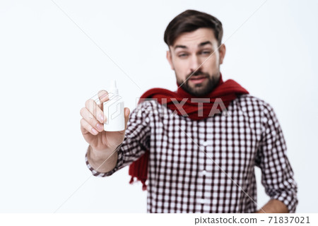 Man shows spray from a serious illness.  71837021