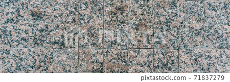 Texture of gray stone paving stones in close-up 71837279