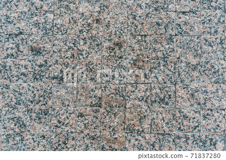 Texture of gray stone paving stones in close-up 71837280