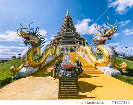 Wat Huay Pla Kang, white big buddha and dragons in Chiang Rai, Chiang Mai province, Thailand Wat Huay Pla Kang, white big buddha and dragons in Chiang Rai, Chiang Mai province, Thailand 71837323