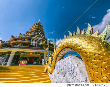 Wat Huay Pla Kang, white big buddha and dragons in Chiang Rai, Chiang Mai province, Thailand 71837478