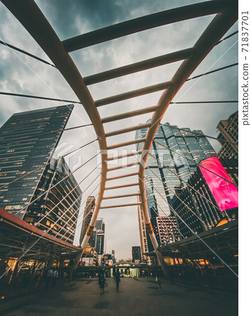 Chong Nonsi skywalk arch bridge at sky train station BTS in Sathorn business district in Bangkok 71837701