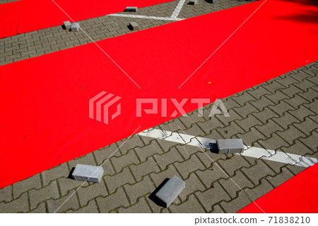 Paved ground with red stripes Paved ground with red stripes 71838210