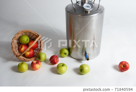 Image of metal hooch with apples on white background Image of metal hooch with apples on white background 71840594
