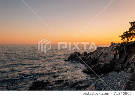 Sunset of Haeundae Dongbaekseom island and sea in Busan, Korea 71840903