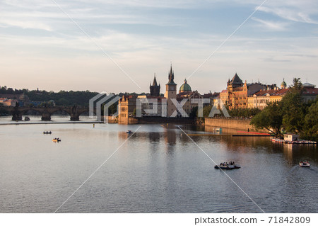 Charles bridge prague sunset light beautiful river water panoramic view Charles bridge prague sunset light beautiful river water panoramic view 71842809