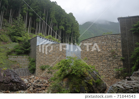 Round-shaped sabo dam (Yakushidani Valley, Uwajima City, Ehime Prefecture) 71844543