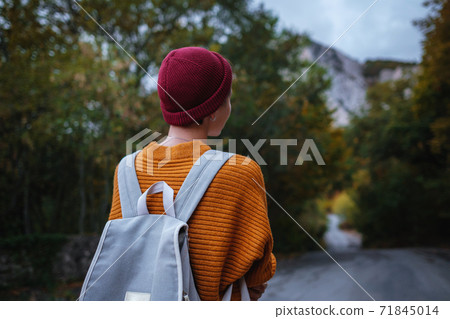 Outdoor fashion photo of young beautiful lady surrounded autumn forest in mountains Outdoor fashion photo of young beautiful lady surrounded autumn forest in mountains 71845014