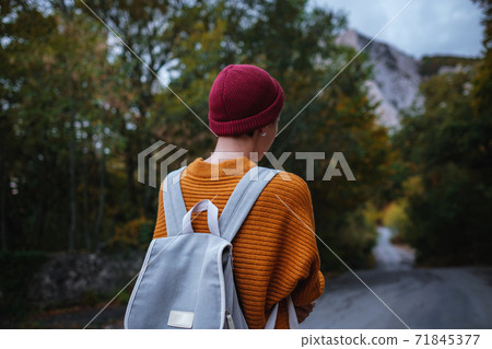 Outdoor fashion photo of young beautiful lady surrounded autumn forest in mountains Outdoor fashion photo of young beautiful lady surrounded autumn forest in mountains 71845377