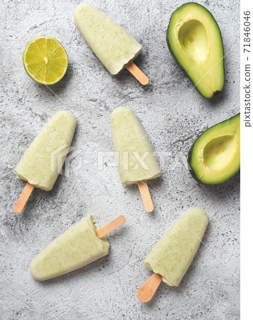 avocado lime popsicle, top view, vertical avocado lime popsicle, top view, vertical 71846046