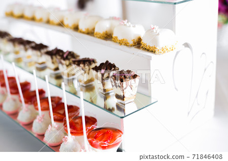 Buffet with a variety of delicious sweets, food ideas, celebration 71846408