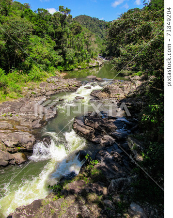 Flowing water and natural pool in the Isalo National Park in Madagascar Flowing water and natural pool in the Isalo National Park in Madagascar 71849204