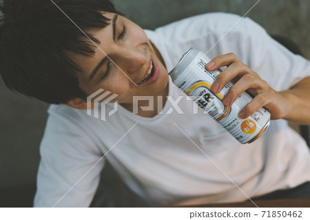 Young people drinking canned beer Young people drinking canned beer 71850462