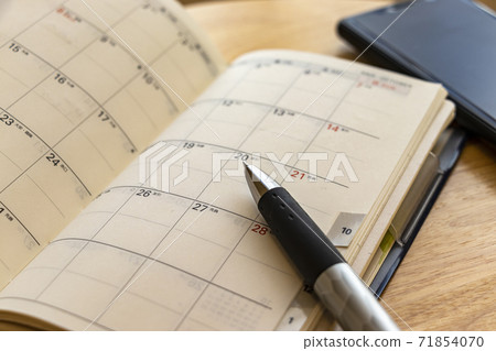 Schedule management with a notebook calendar 71854070