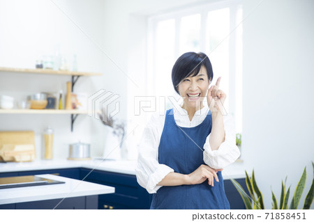 Woman in the kitchen 71858451