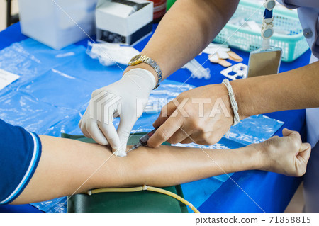 doctor injection needle on arm to collect blood for test the health selective focus syringe doctor injection needle on arm to collect blood for test the health selective focus syringe 71858815
