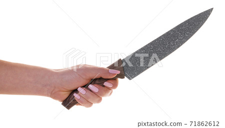 kitchen knife in female hand kitchen knife in female hand 71862612