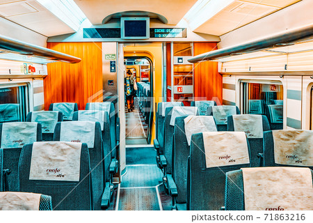 Interior of modern hi-speed passenger train of Spanish railways Interior of modern hi-speed passenger train of Spanish railways 71863216